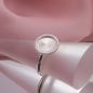 Preview: Silberring Coletta Facet aus Sterling Silber mit komplett gefräster 12 mm Ronde, die das Licht in feinen Rillen intensiv bricht.